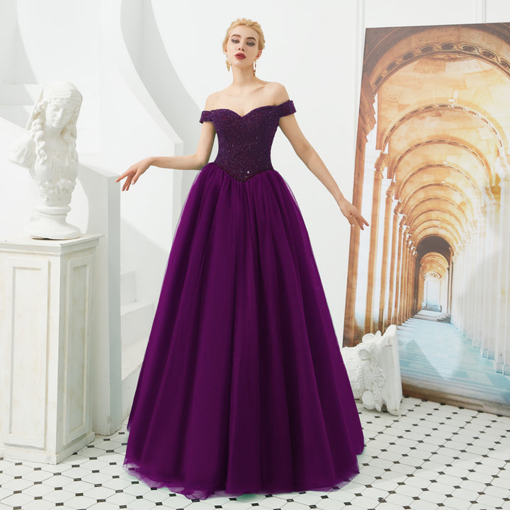 purple ball gown prom dress with off the shoulder neckline
