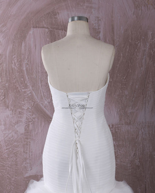 Strapless Fit and Flare Dress with Rosette Ruffle Skirt Strapless Fit and Flare Dress with Rosette Ruffle Skirt